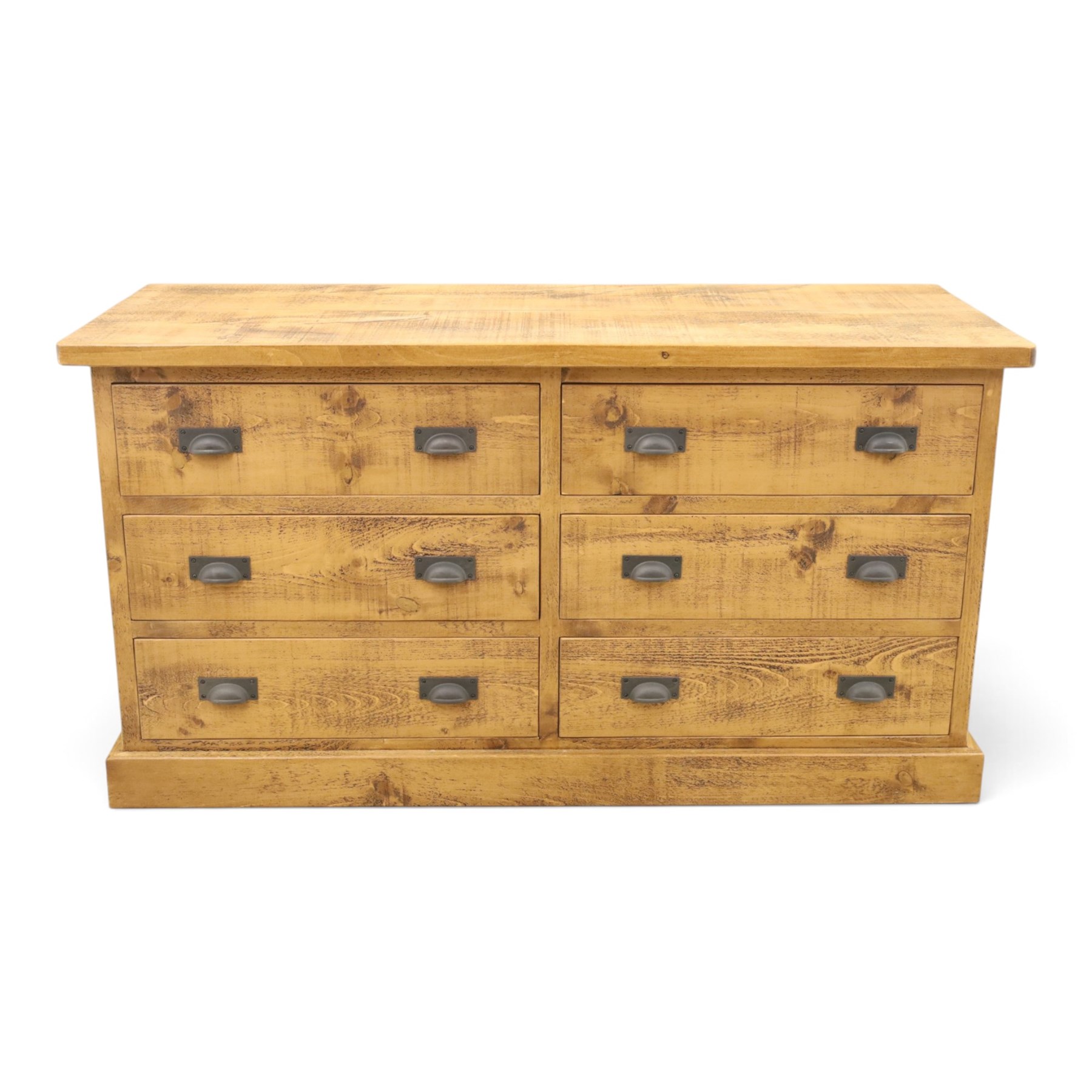 Indigo Furniture - large rustic oak chest, rectangular top fitted with six drawers with metal pull handles, on skirted base