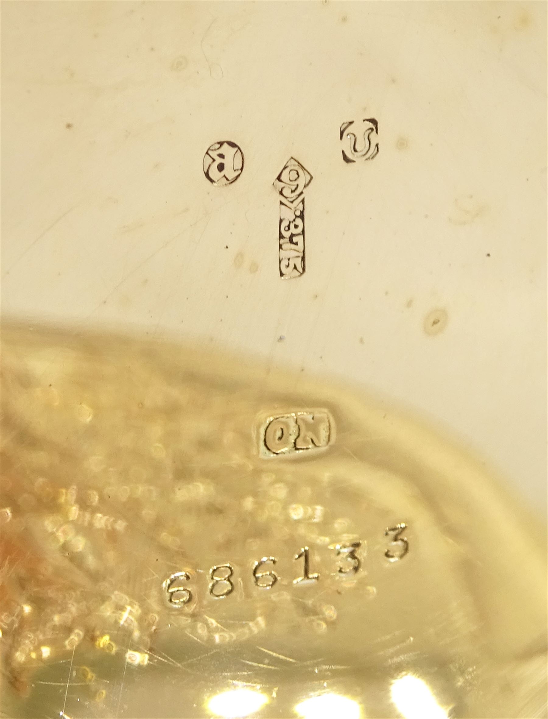 Early 20th century 9ct gold half hunter keyless lever pocket watch, No. 590035, white enamel dial with Roman numeral hour markers and subsidiary seconds dial, the inner dust cover with engraved flower basket decoration, case with London import marks 1916