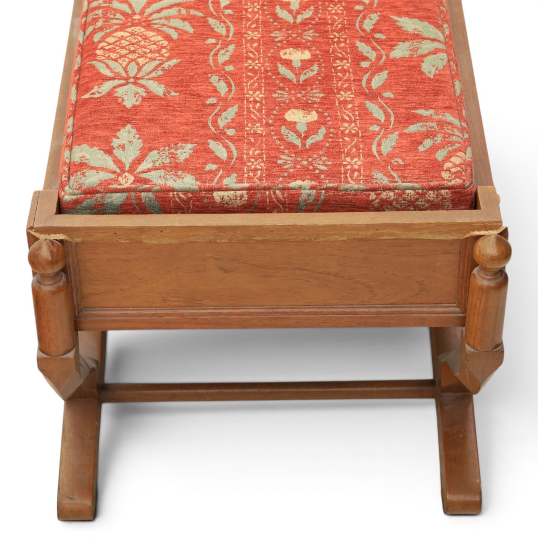Traditional design teak long foot stool, red patterned seat cushion, on an X-frame base