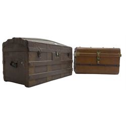 Early 20th stained dome-top and metal bound travelling trunk (W77cm D41cm H46cm); and a mid-20th century scumbled metal travelling case with hinged top (W64cm D44cm H42cm)
