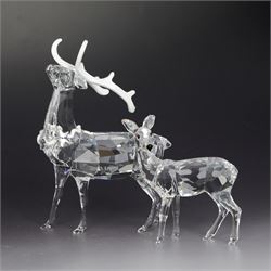 Two Swarovski figures, comprising Doe and Christmas Stag, both in original boxes 
