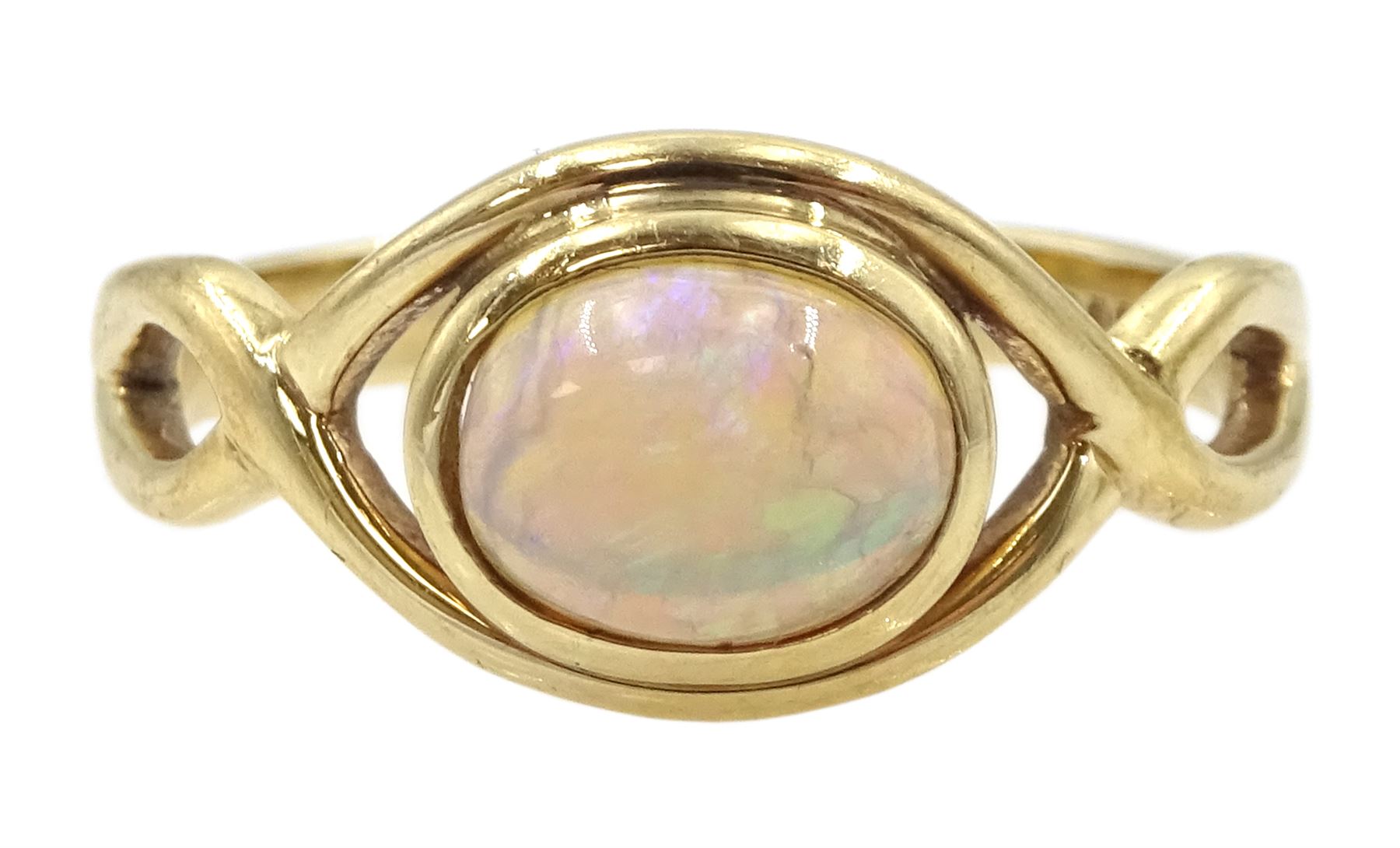 9ct gold single stone opal ring, with crossover design shoulders, Sheffield 2005