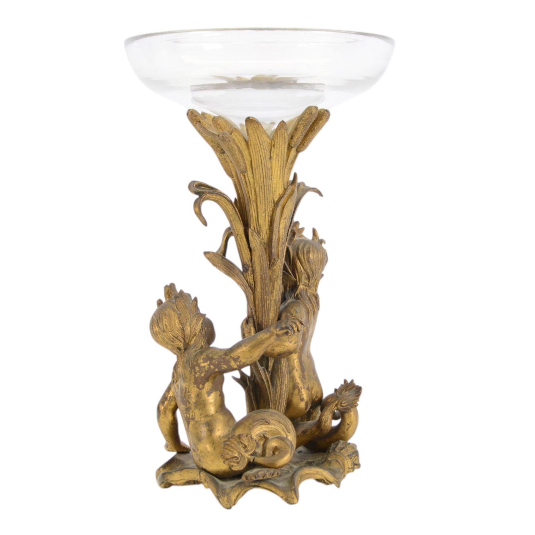 19th century French bronze ormolu centrepiece, the stem cast in relief with reeds holding aloft a glass bowl, supported by two mermen upon a naturalistic base, including bowl H38cm