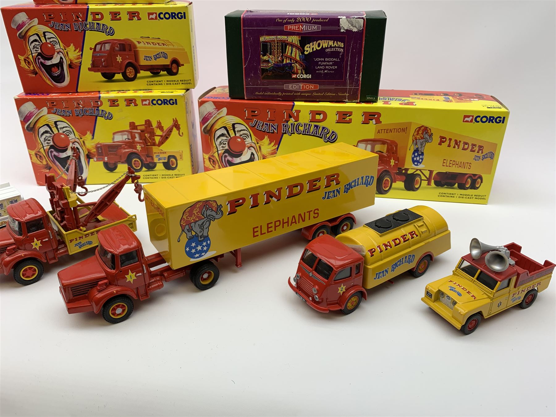 Four Corgi limited edition Pinder Jean Richard circus vehicles - 07201 Land Rover Pick-Up; 70101Berliet TLR Semi Fourgon; 70401 Berliet GLR8 Depanneuse; and 71202 Renault Faineant Citerne; together with Corgi Premium Edition Showman's Collection 07413 John Biddall Funfair Land Rover with horse; all mint and boxed with certificates (5)