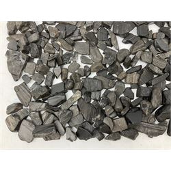 Collection of raw Whitby jet including large piece with one polished side, approx 4lbs