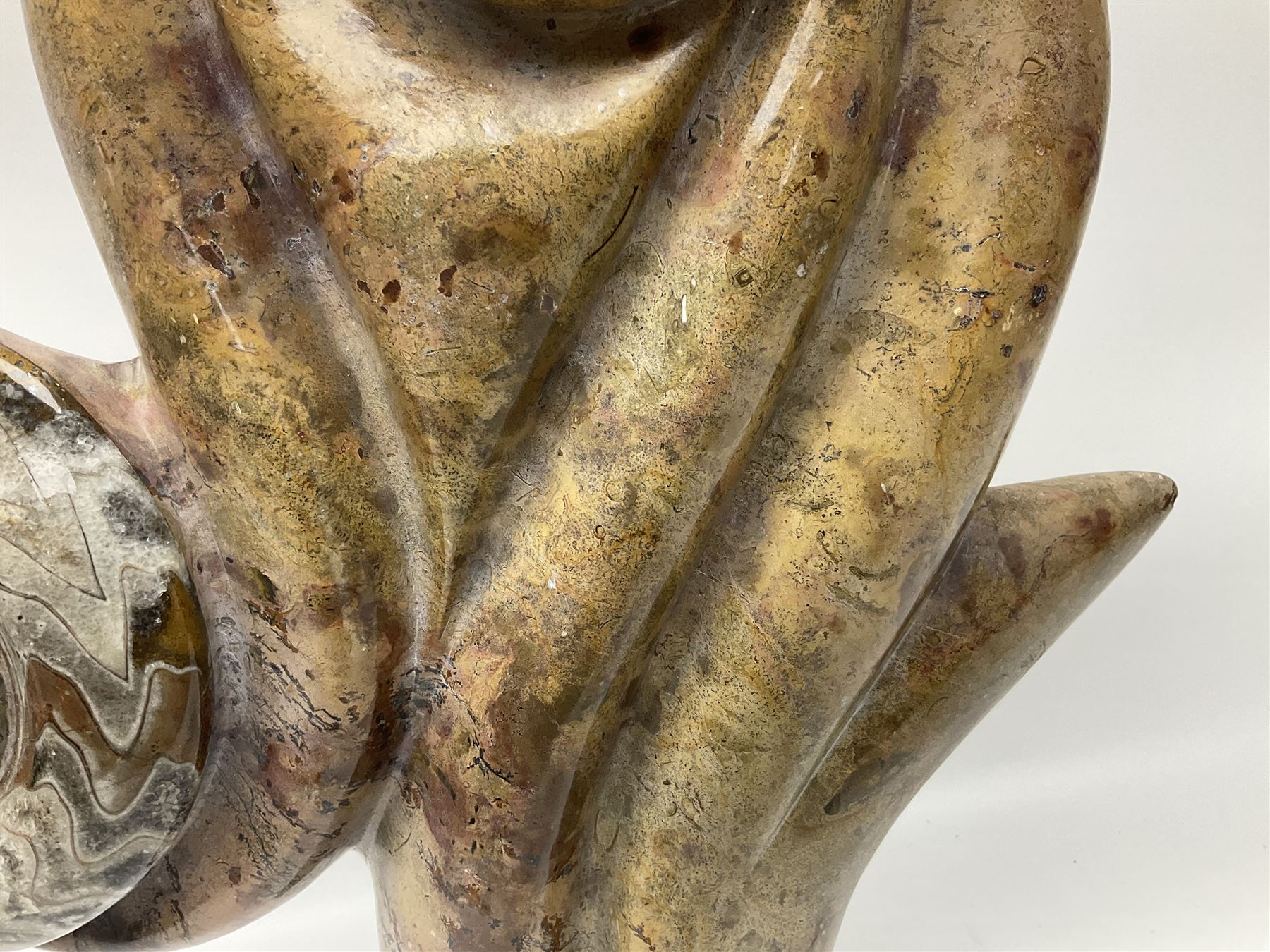 Goniatite sculpture, displaying two Goniatites within a polished and shaped matrix, age; Devonian period, H56cm