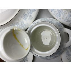 Royal Doulton tea and dinner wares in the Meadow Mist pattern, no H5007, comprising seven dinner plates, eight side plates, two lidded tureens, two jugs, lidded sucrier, oval serving dish, six teacups, seven saucers, seven tea plates and large saucer