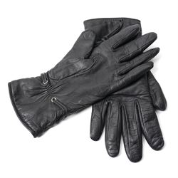 Hermès - pair of black leather gloves, lined in 100% cashmere, with pierced oval leather strap detail to cuffs, size 8