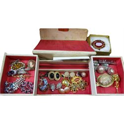Collection of silver and costume jewellery including earrings, brooches, rings, necklaces and wristwatches in jewellery boxes and a small leather suitcase