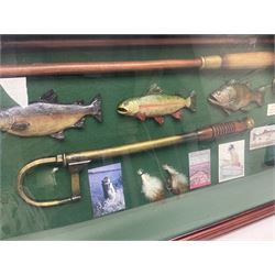 Four framed sporting memorabilia displays, the largest example containing 1930s cricket memorabilia, together with two fishing displays and a football display, each within wooden glazed frames, largest H105cm