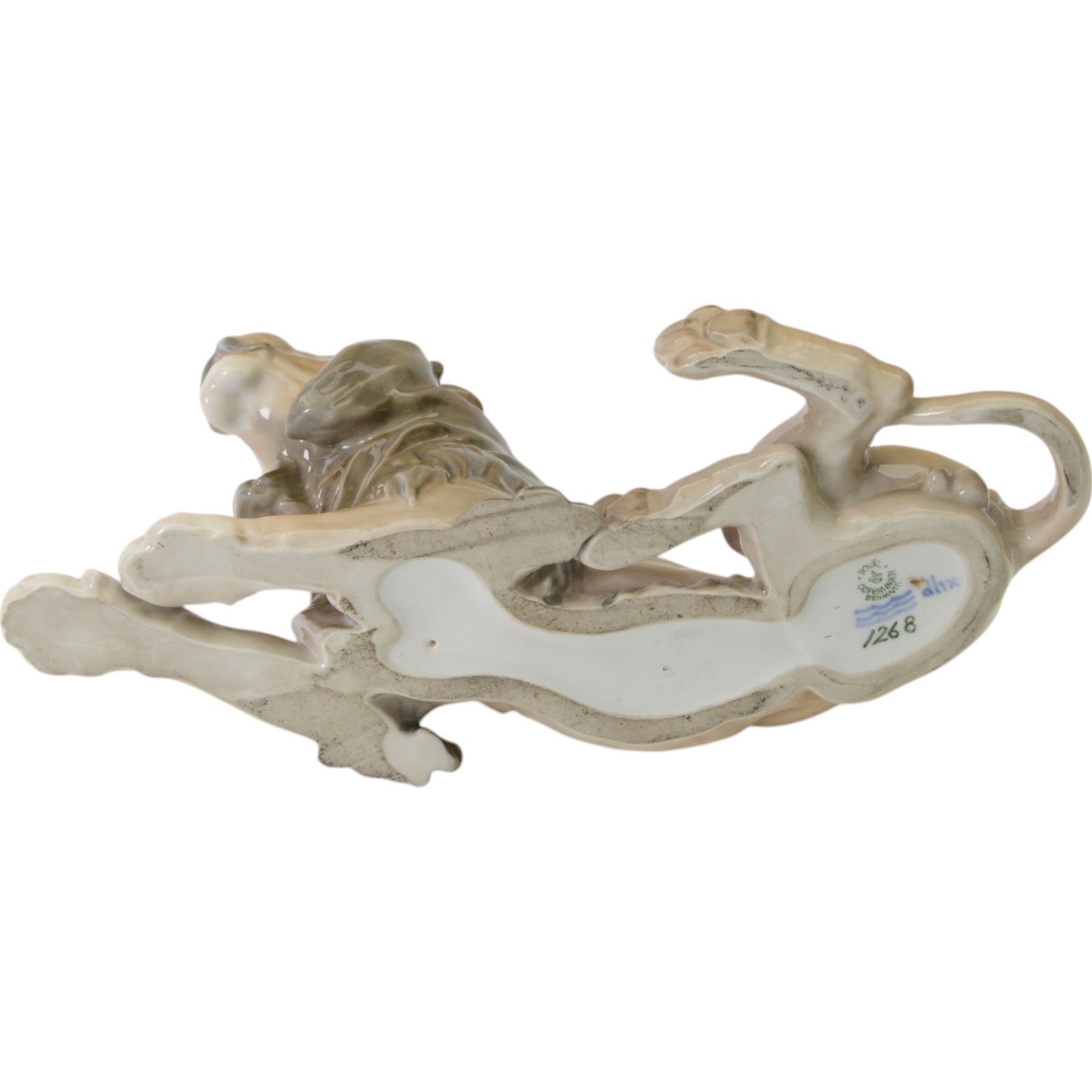 Royal Copenhagen recumbent lion, no.1268, with printed marks beneath H16cm
