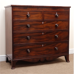  George III figured mahogany chest, two short and three long oak lined drawers, box wood inlaid frieze, turned rosewood handles, shaped apron with splayed feet, with single key, W121cm, H112cm, D55cm  