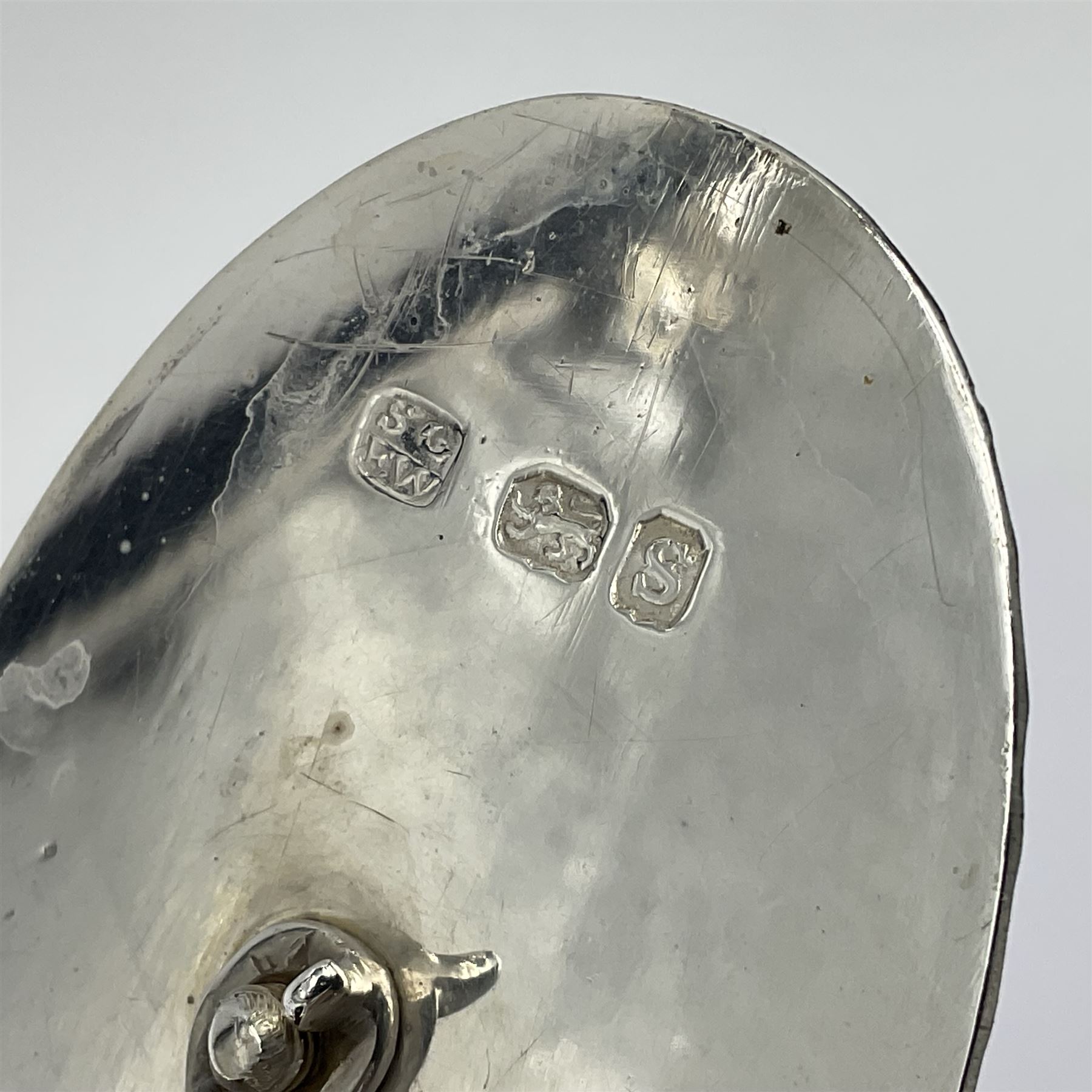 George III silver bachelors teapot, of oval form with wooden scroll handle and finial, the body chased with armorial crest and ribbon swag and foliate detail, hallmarked Samuel Godbehere & Edward Wigan, London 1793, including handle H9cm