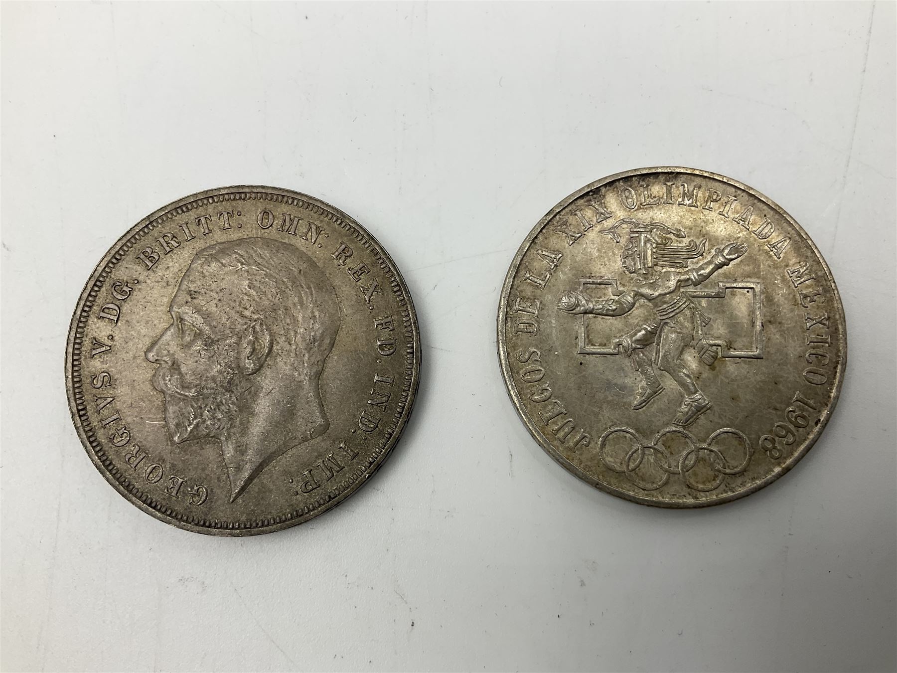Two United States of America silver Morgan dollars dated 1885 O, 1888 O, King George V 1935 crown coin, and Mexico 1968 twenty-five pesos coin