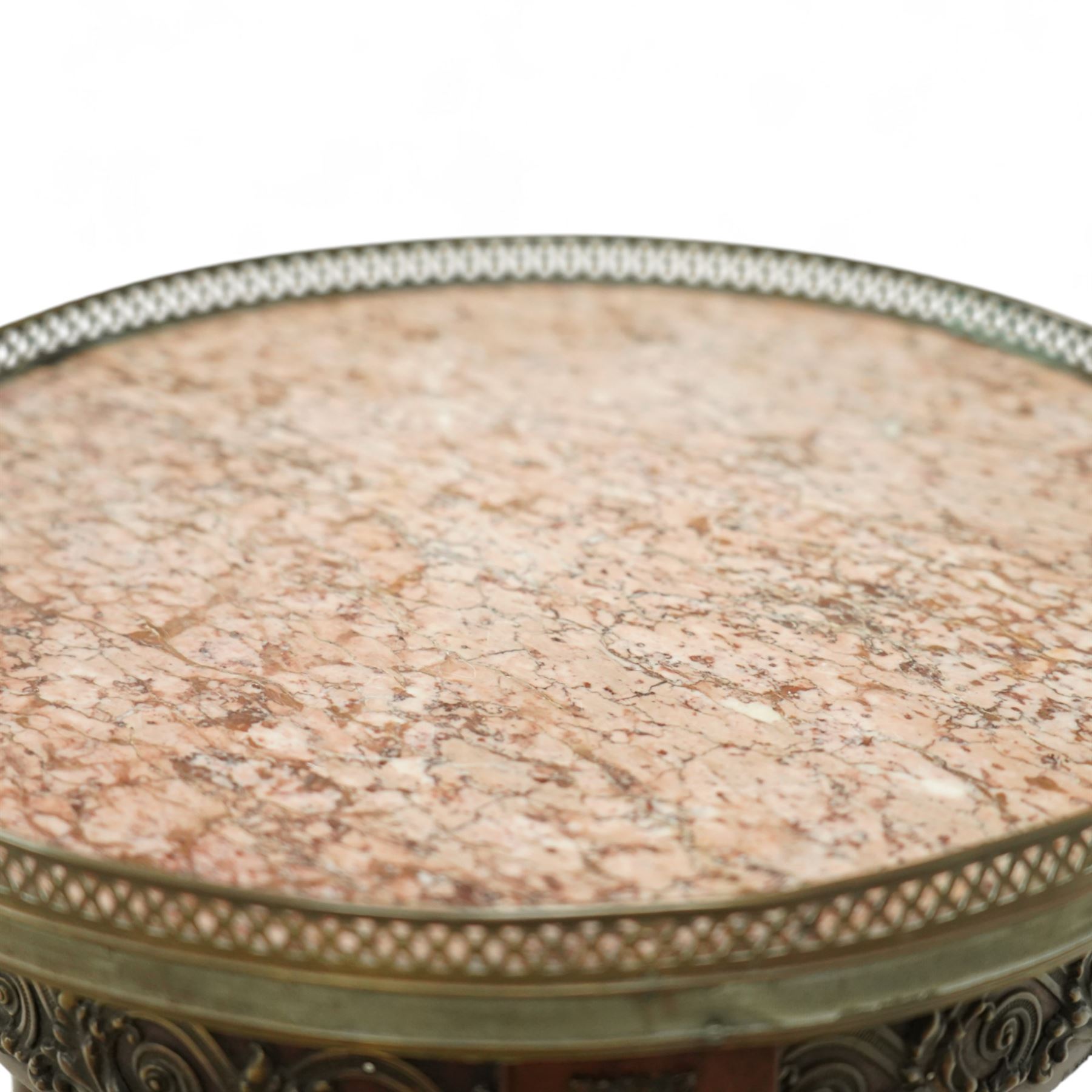 Late 19th century French Empire style mahogany and gilt metal mounted jardinière stand, circular rouge marble top with pierced brass gallery, on three turned supports joined by an undertier stretcher and splayed legs