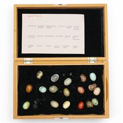Collection of approx ninety named semi precious stone eggs in five Dunhill cigar boxes 