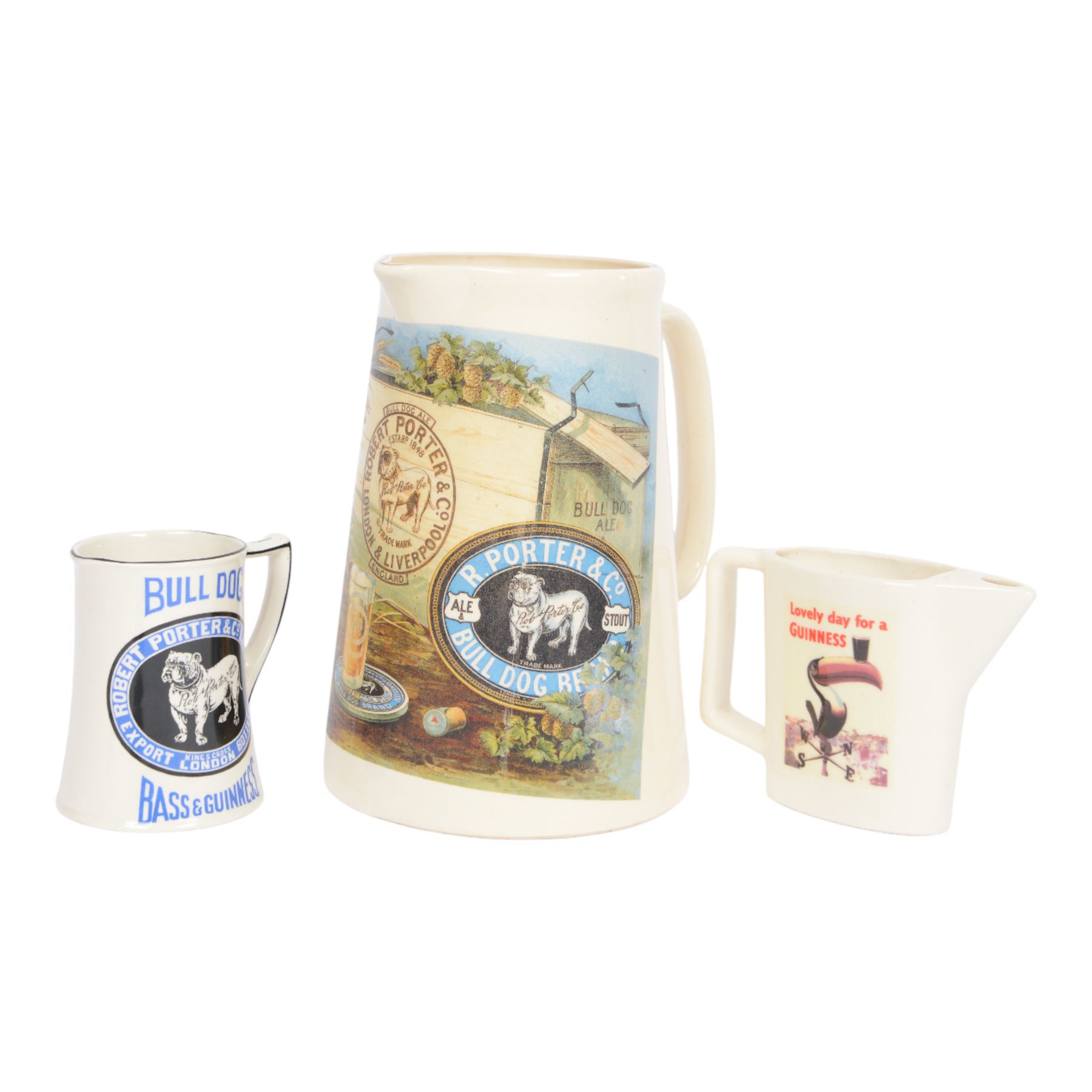 The Hill Church Potteries Bulldog Bass and Guinness Robert Porter & Co water jug, together with another Robert Porter and Co jug and Lovely Day for a Guinness jug, largest H23cm