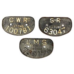 Three cast iron railway wagon plates of D shaped form to include Southern Railway, LMS and GWR, L27.5cm