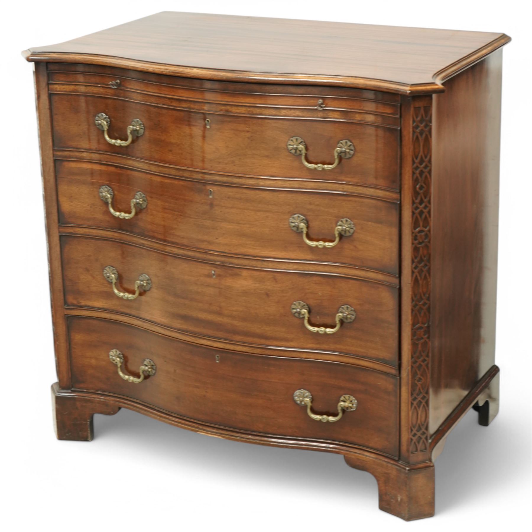 Television cabinet in the form of a Georgian mahogany serpentine chest, flanked by blind fret work decoration, retractable hinged dummy drawer panel revealing interior, with brass swan neck handles, supported on bracket feet 
