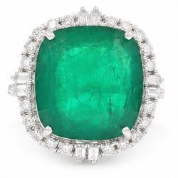 18ct white gold emerald and diamond cluster ring, single cushion cut emerald of approx 13.20 carat, surrounded by round brilliant and baguette cut diamonds and diamond set shoulders, stamped 18K, total diamond weight approx 1.00 carat