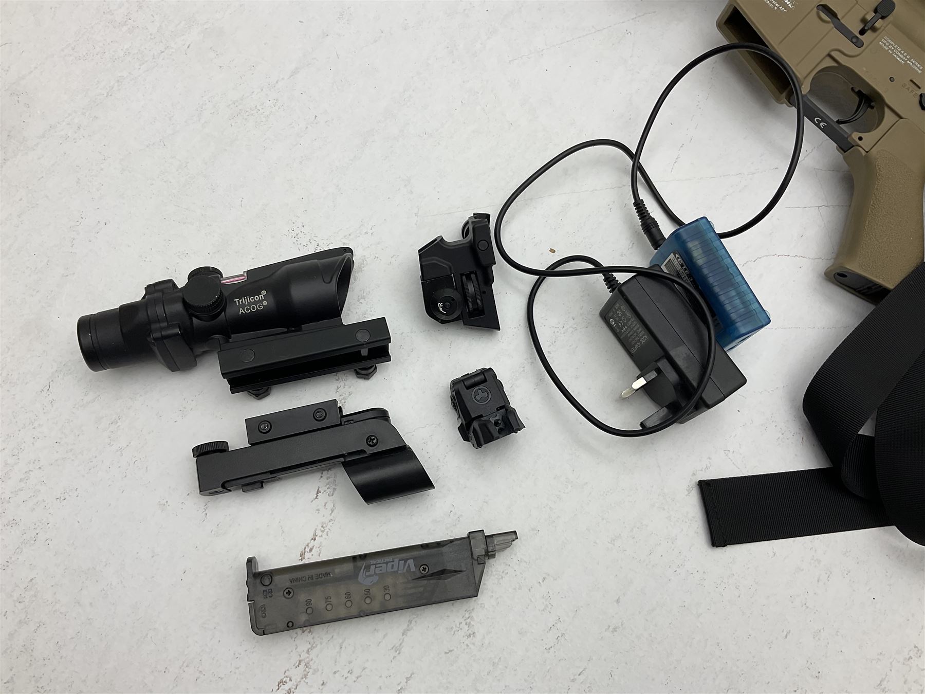 Combat Machine lithium battery powered airsoft BB rifle, 'Complete AEG Series' to fire 5mm pellets, with adjustable length stock L69cm non-extended; with six magazines, Trijicon ACOG red dot telescopic sight, battery charger etc (NO BATTERIES)