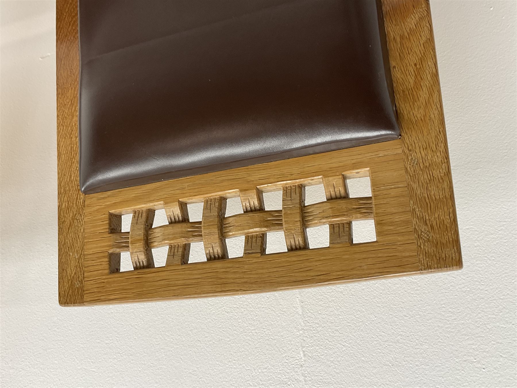 'Lizardman' set six dining chairs, two carvers and four side chairs, carved and pierced lattice top rail over cushioned back and drop in seat upholstered in brown leather, by Derek Slater of Crayke