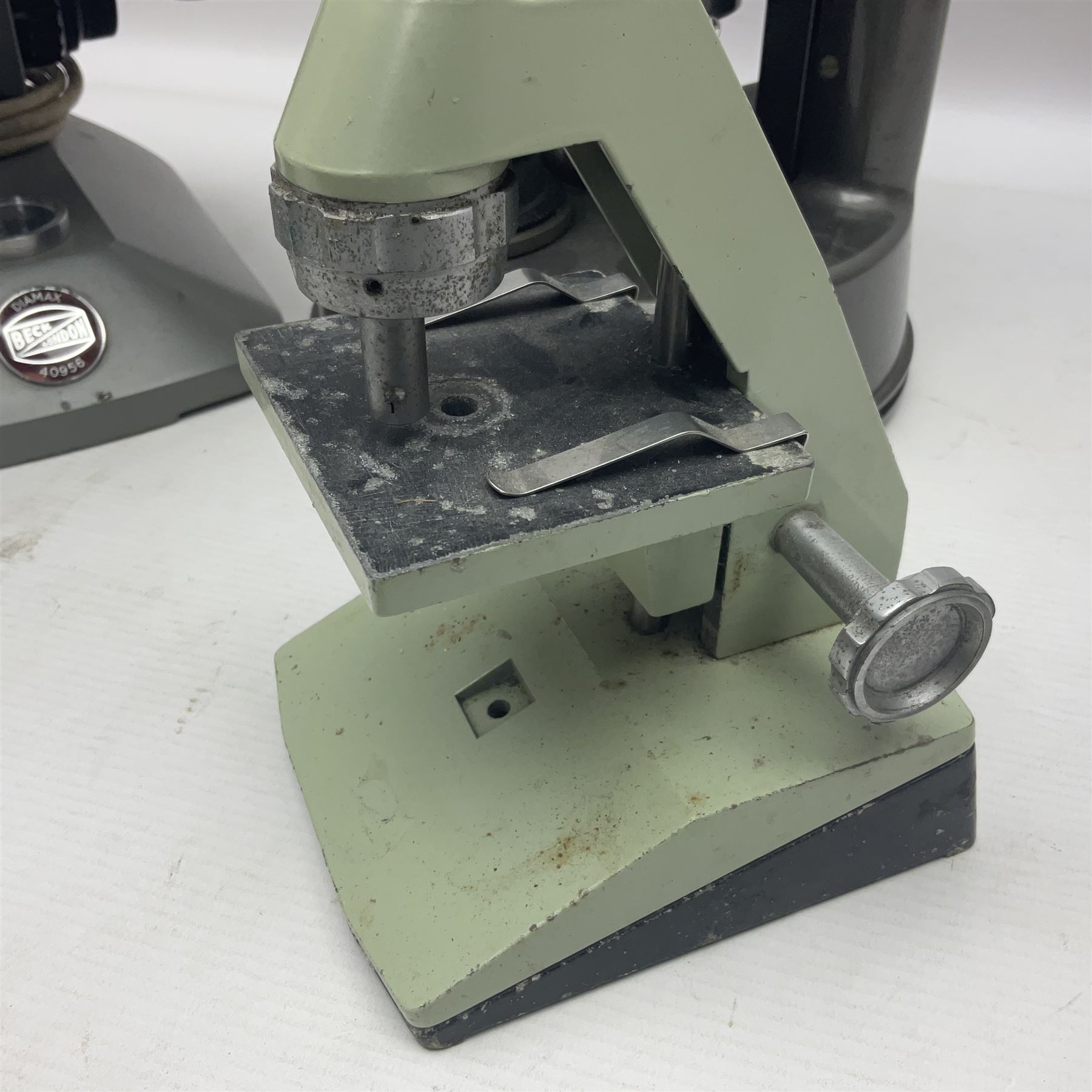 Four microscopes, comprising C Baker London Vickers, Back Diamax no 40956, Opax ABF no 232733 and one other 