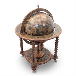 20th century Italian reproduction globe drinks table, the cartographic sphere decorated with Renaissance-style map scenes, hinged upper section enclosing bottle storage, with printed zodiac and calendar ring to the top, on spiral-turned legs joined by a compass rose undertier, brass castors below