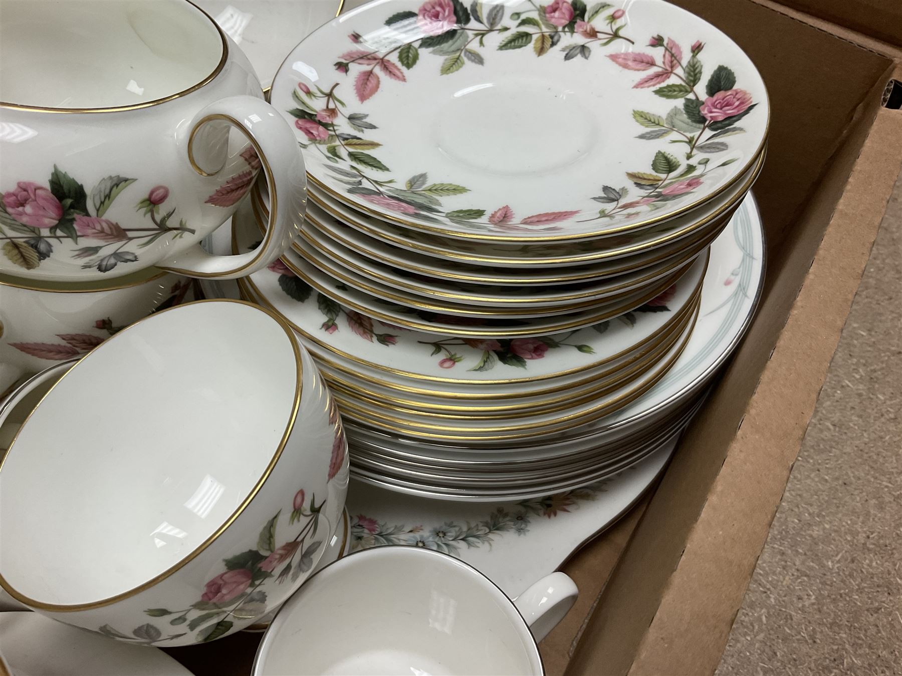 Paragon part dinner service in Belinda pattern, including teapot, six tea cups and saucers, dinner plates etc, together with Royal Doulton part tea service in Carnation pattern, Wedgwood part tea service in Hathaway Rose