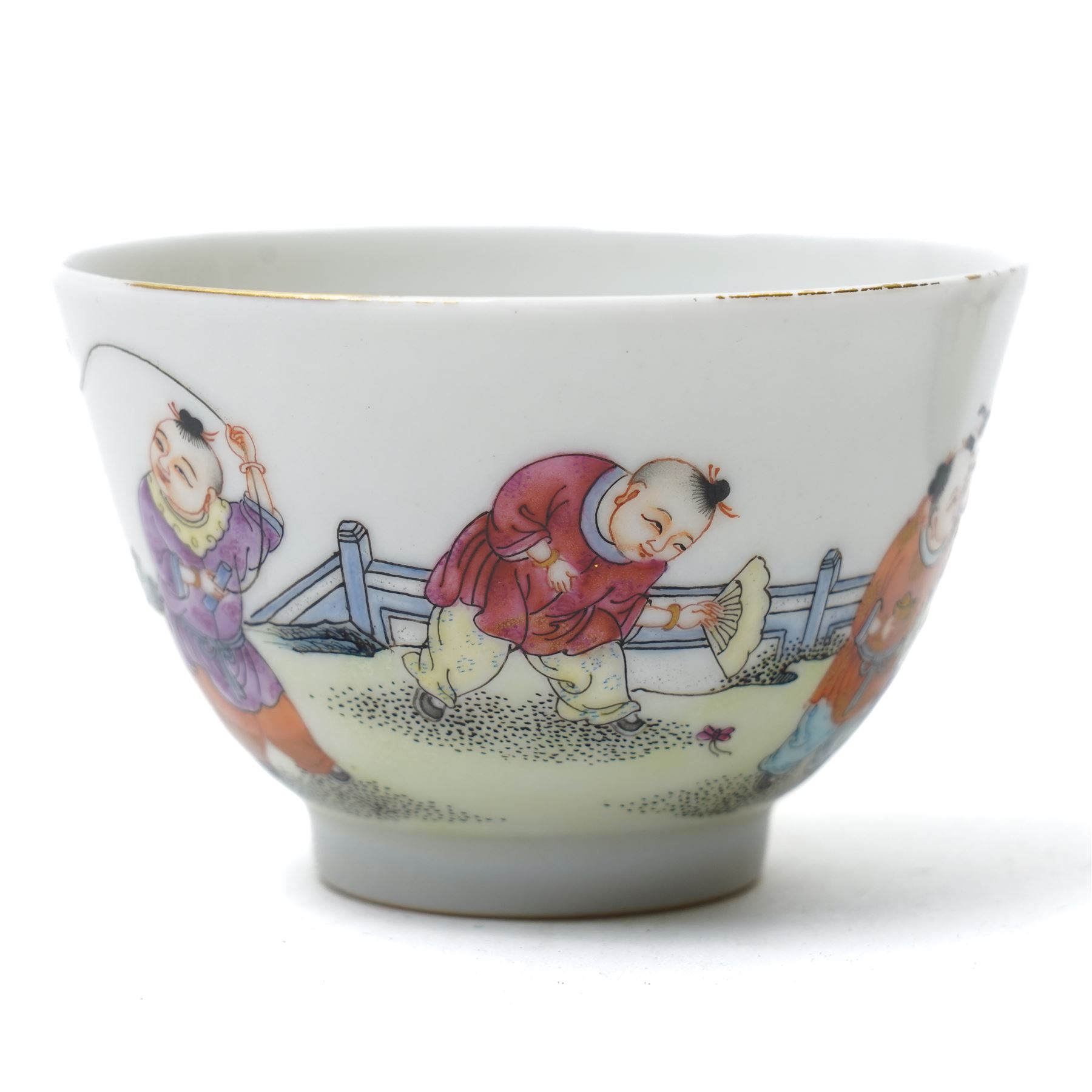 Pair of Yongzheng style tea bowls, decorated with boys playing with birds and butterflies, apocryphal six character mark within blue square to base, H4.5cm