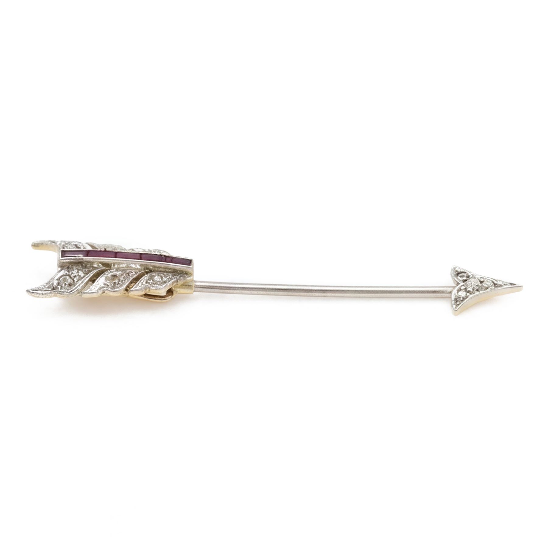 Early 20th century 18ct gold and platinum diamond and ruby arrow brooch