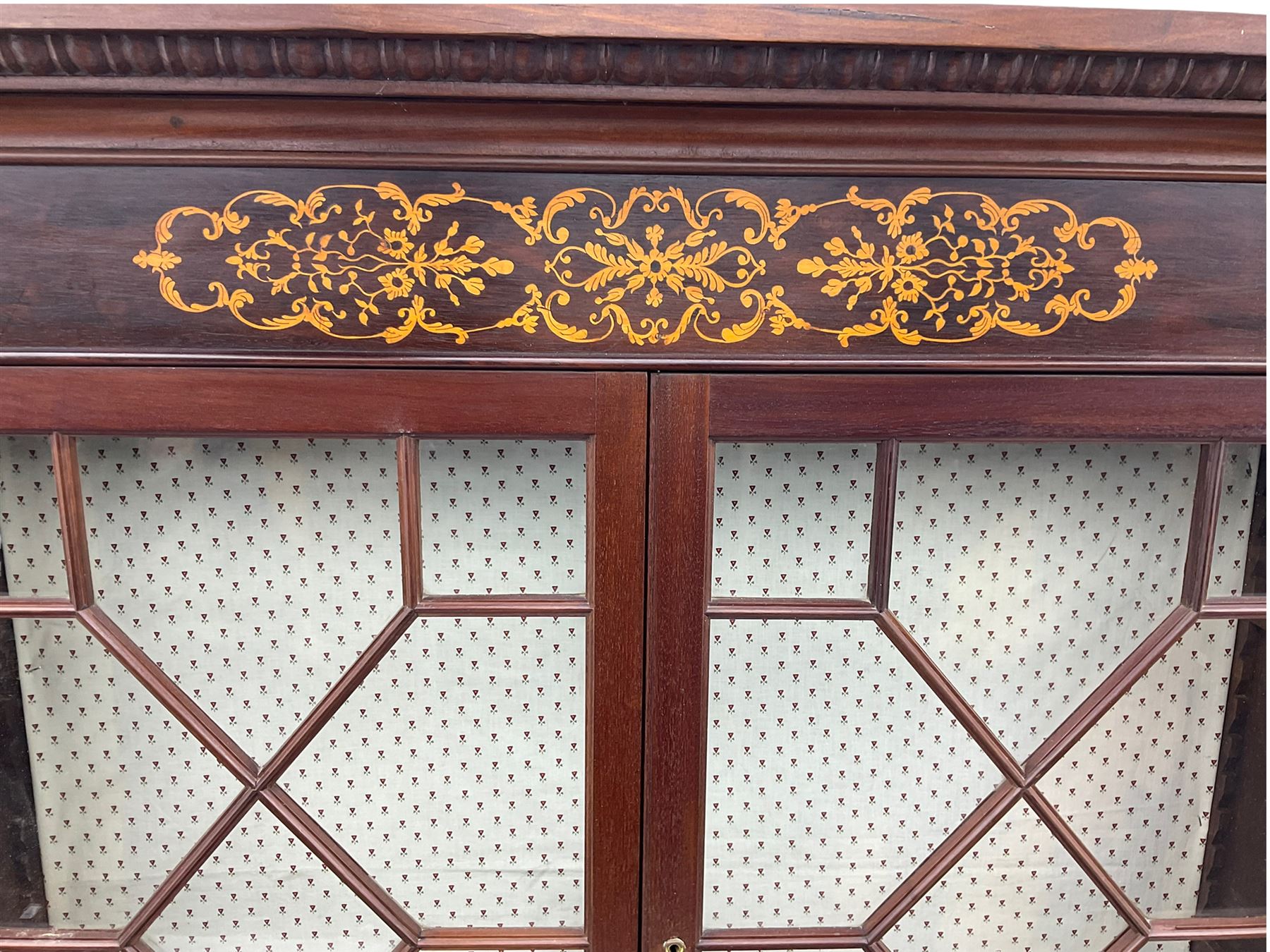 19th century mahogany piano top secretaire bookcase, two astragal doors above curved hinged retractable writing compartment, above two cupboards