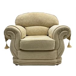 Three piece lounge suite upholstered in beige plain and embossed fabric, comprising two seat sofa and pair of armchairs