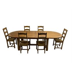 Oak extending dining table, with two additional leaves, together with set six ladder back dining chairs with rush seats