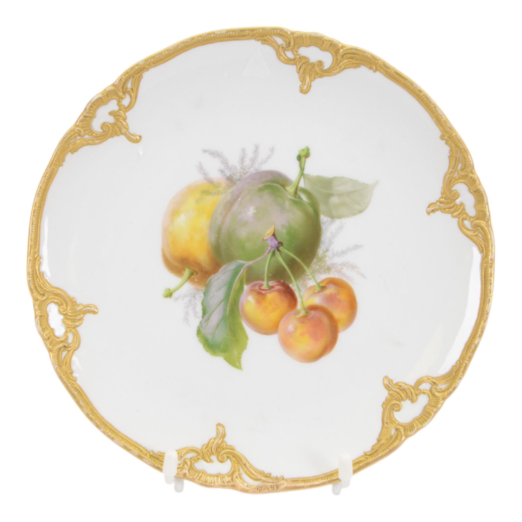 Three early 20th century Berlin KPM hand painted porcelain cabinet plates, each or circular form with tooled gilt detailed rim, and hand painted fruit still life to centre, with painted and printed marks beneath, D19cm