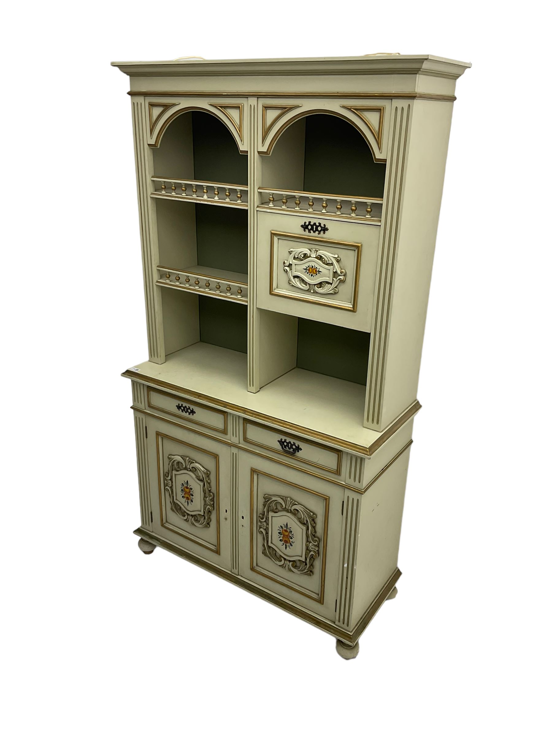 Portuguese painted dresser, two-tier plate rack with spindle gallery and fall-front cupboard, flanked by fluted uprights, fitted with two drawers over two cupboards, the panelled cupboards with floral decoration and a rinceaux border, white painted and parcel-gilt 