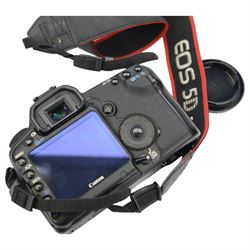 Canon EOS 5D Mark II camera body, serial no. 1631012789, with shoulder strap, battery grip BG-E6 and Canon compact-macro 50mm 1:2.5 EF lens serial no. 282912, in original box