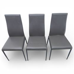 Modern composite marble effect dining table, rectangular top with simulated veining supported on a block pedestal base, accompanied by six matching dining chairs with padded seats and backs in grey upholstery on slim metal legs