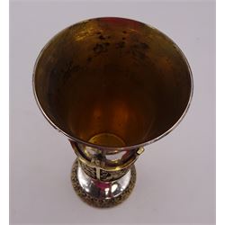 Modern limited edition silver Westminster Abbey Royal Wedding goblet, commemorating the marriage of HRH Prince Andrew and Miss Sarah Ferguson on the 23rd of July 1986, designed by Hector Miller for Aurum, the tapering cylindrical bowl with gilt interior and parcel gilt pierced band to base depicting the Royal Arms, upon knopped stem and circular stepped foot with floral parcel gilt rim, no. 483/750,  hallmarked Hector Miller, London 1986, H17cm