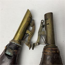 Two leather shot flasks with embossed decoration and brass nozzles; scissor action bullet mould with two ladles; pair of 19th century J.B. Warrilow hammer actions; small quantity of Staybrite buttons; and 1968 dated metal ammunition tin for 200 x 7.62 blank cartridges