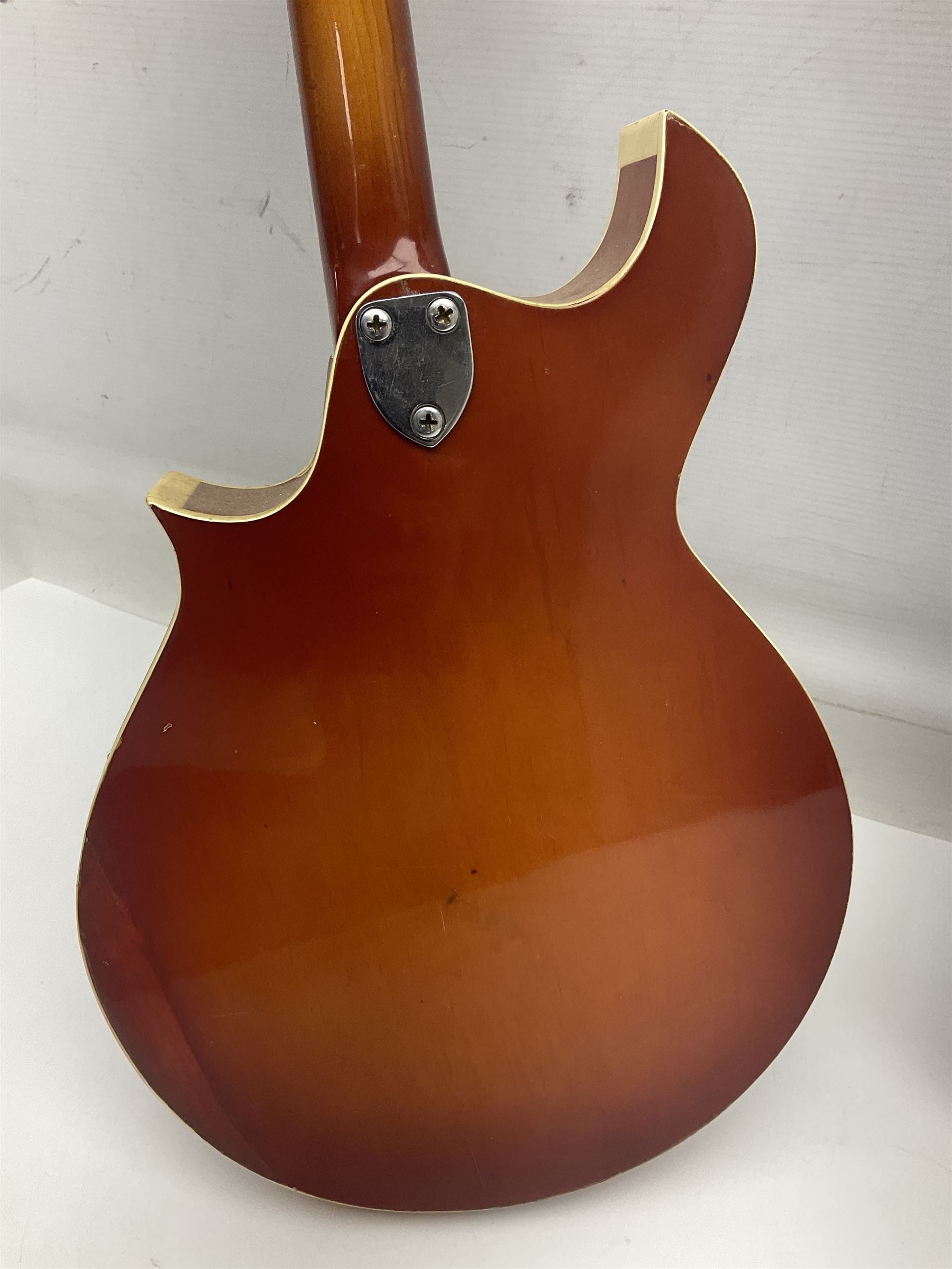 Eastern eight-string mandolin with sunburst finish and mother-of-pearl inlay L68.5cm; and another Harmony mandolin with cracked headstock (2)