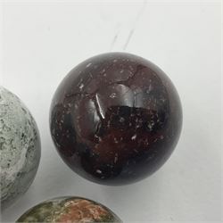 Six mineral specimens spheres, comprising jasper red, spotted agate, unakite, sardonyx, petrified wood and bloodstone, D2cm