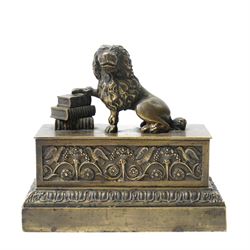 19th-century Grand Tour patinated bronze inkwell, surmounted by a recumbent lion, the beas...