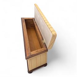 Late Victorian angular framed mahogany bay window seat, hinged lid with moulded upholstered padded seat, over upholstered front and sides, raised on compressed bun feet  