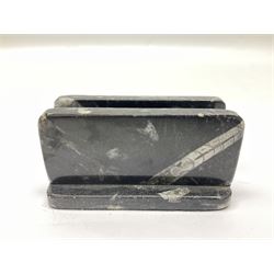 Three piece desk set, comprising letter rack, dish and box with raised Orthoceras to the lid, all with Orthoceras and Goniatite inclusions, age: Devonian period, location: Morocco