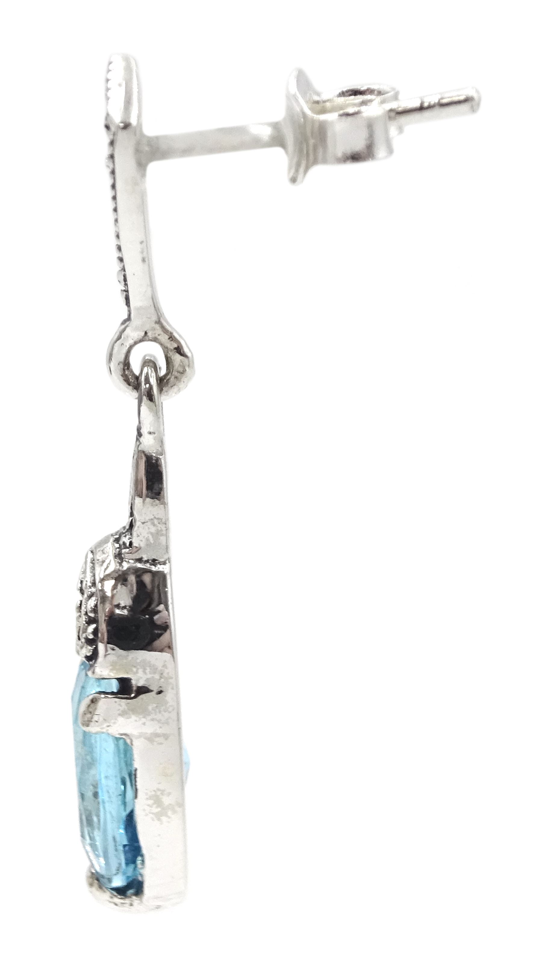 Pair of silver blue stone and marcasite pendant stud earrings, stamped 925 