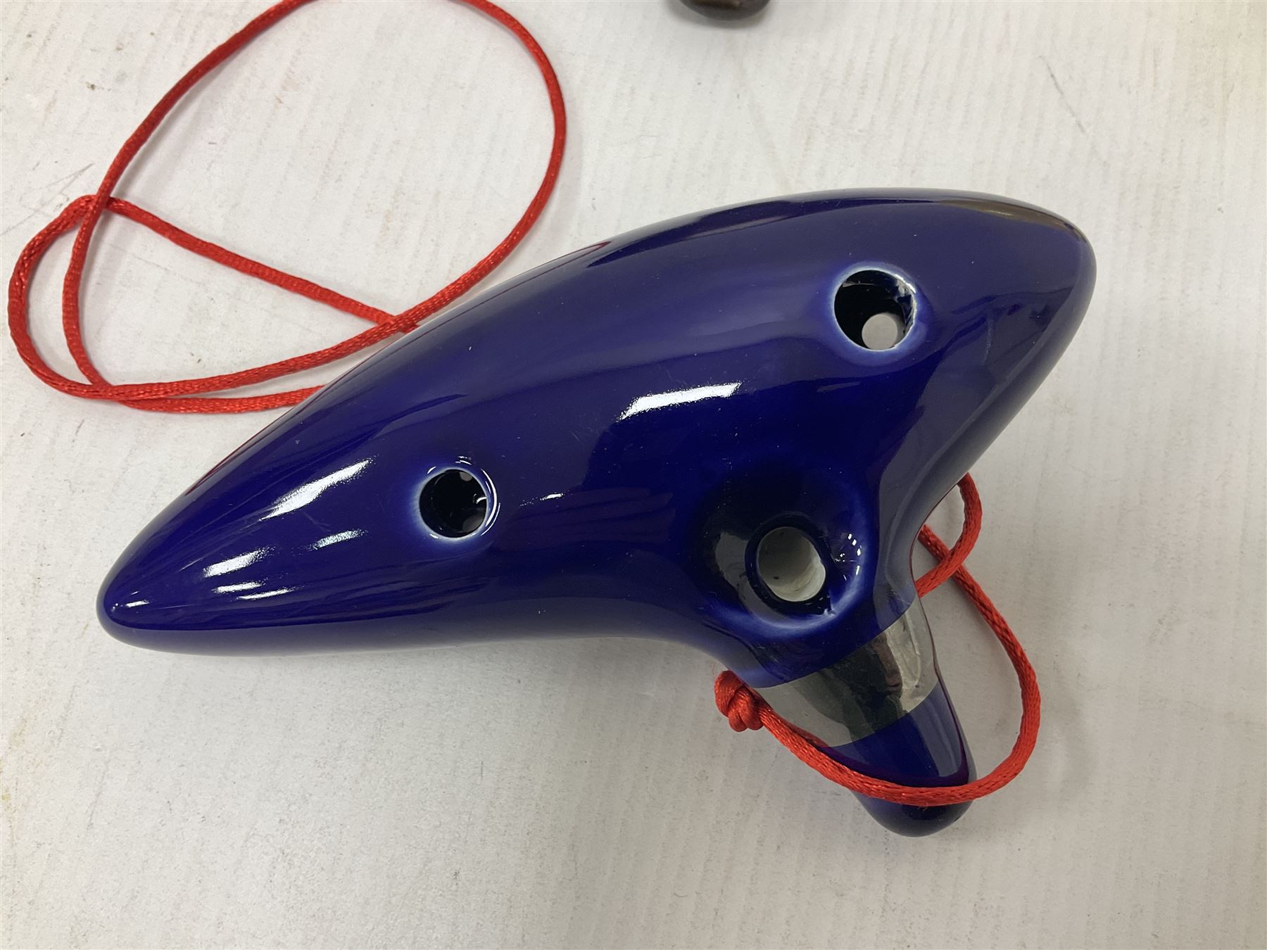 Four ocarinas three 10 hole ocarinas and one 16 hole double ocarina, three of which being from the Legend of Zelda franchise 