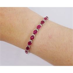 18ct white gold oval ruby and round brilliant cut diamond bracelet, stamped, total ruby weight approx 9.65 carat