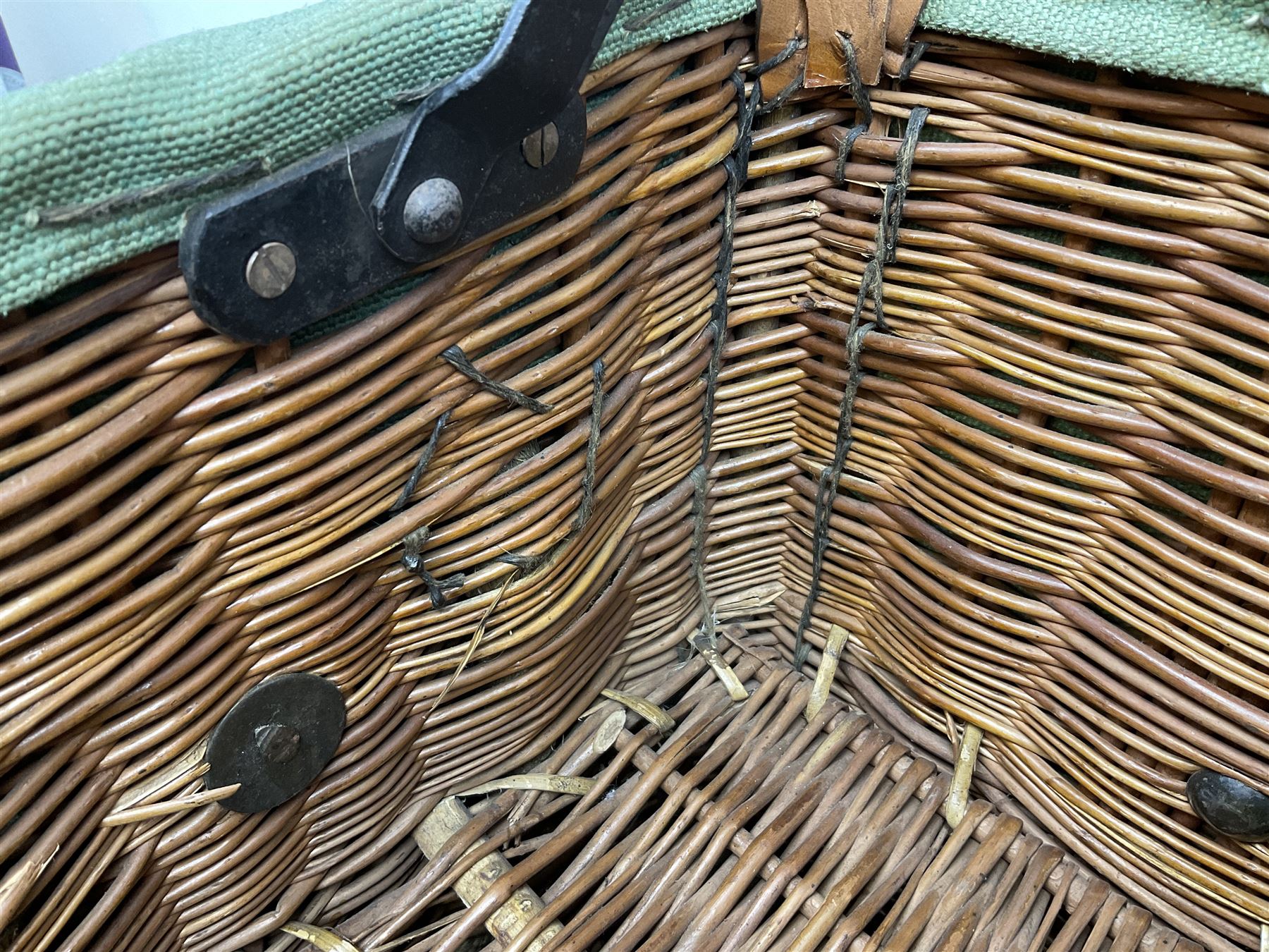 WW2 British Army RAMC 'Regimental Medical Pannier', well marked externally and dated 1941, stamped May 1943 internally, canvas covered wicker form with leather edges, hinged top and fall front with two rope carrying handles, fitted iron locking straps with securing chains; contains various unused field dressings and bandages with WW2 dates and two pillows; original label under lid L79cm