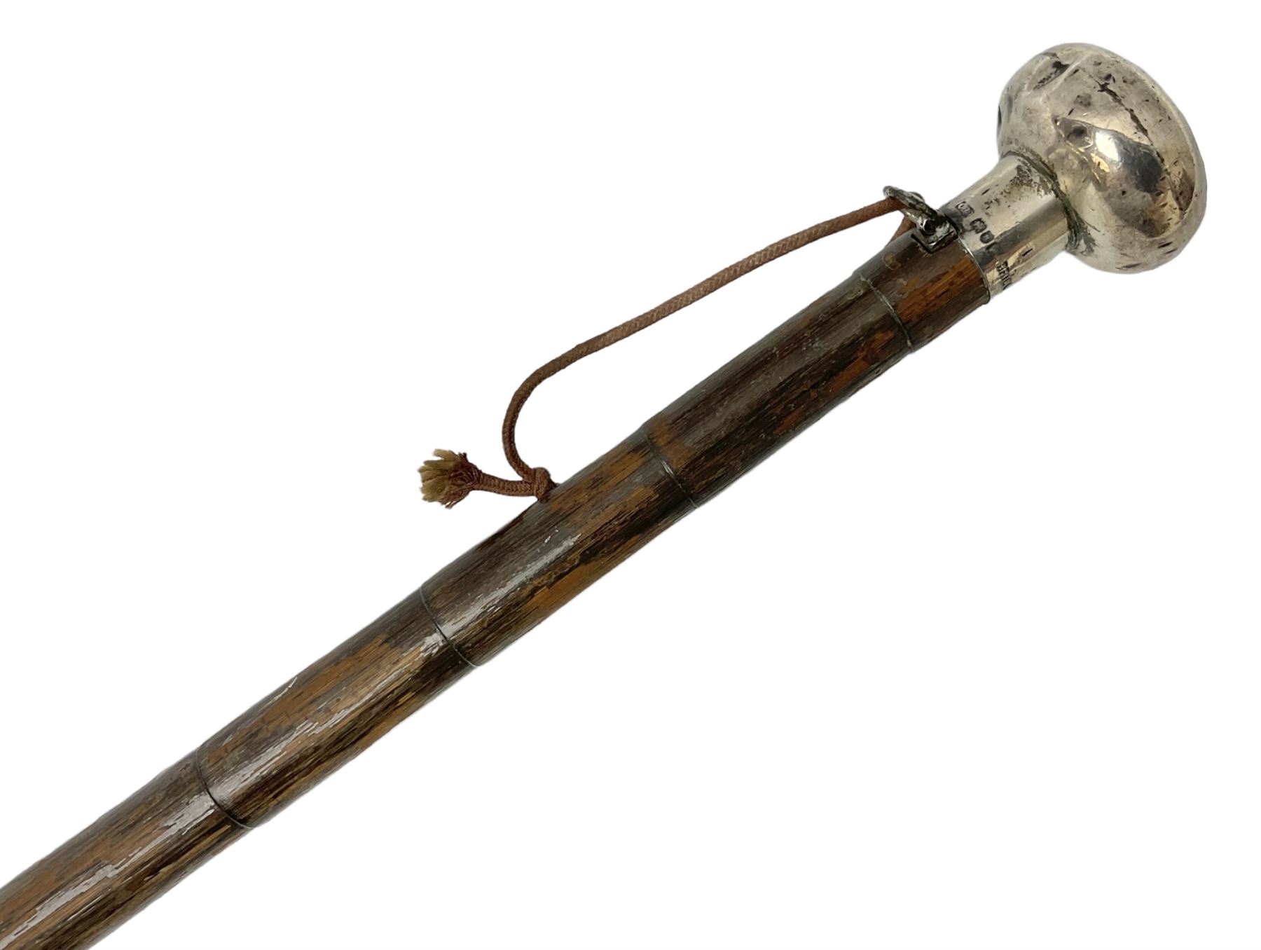 Edwardian novelty parasol by Briggs of London, the bamboo shaft with brown fabric canopy, and silver mounted terminal concealing a silver mounted pencil, hallmarked Charles Henry Dumenil, London 1904, also marked Briggs, H93cm